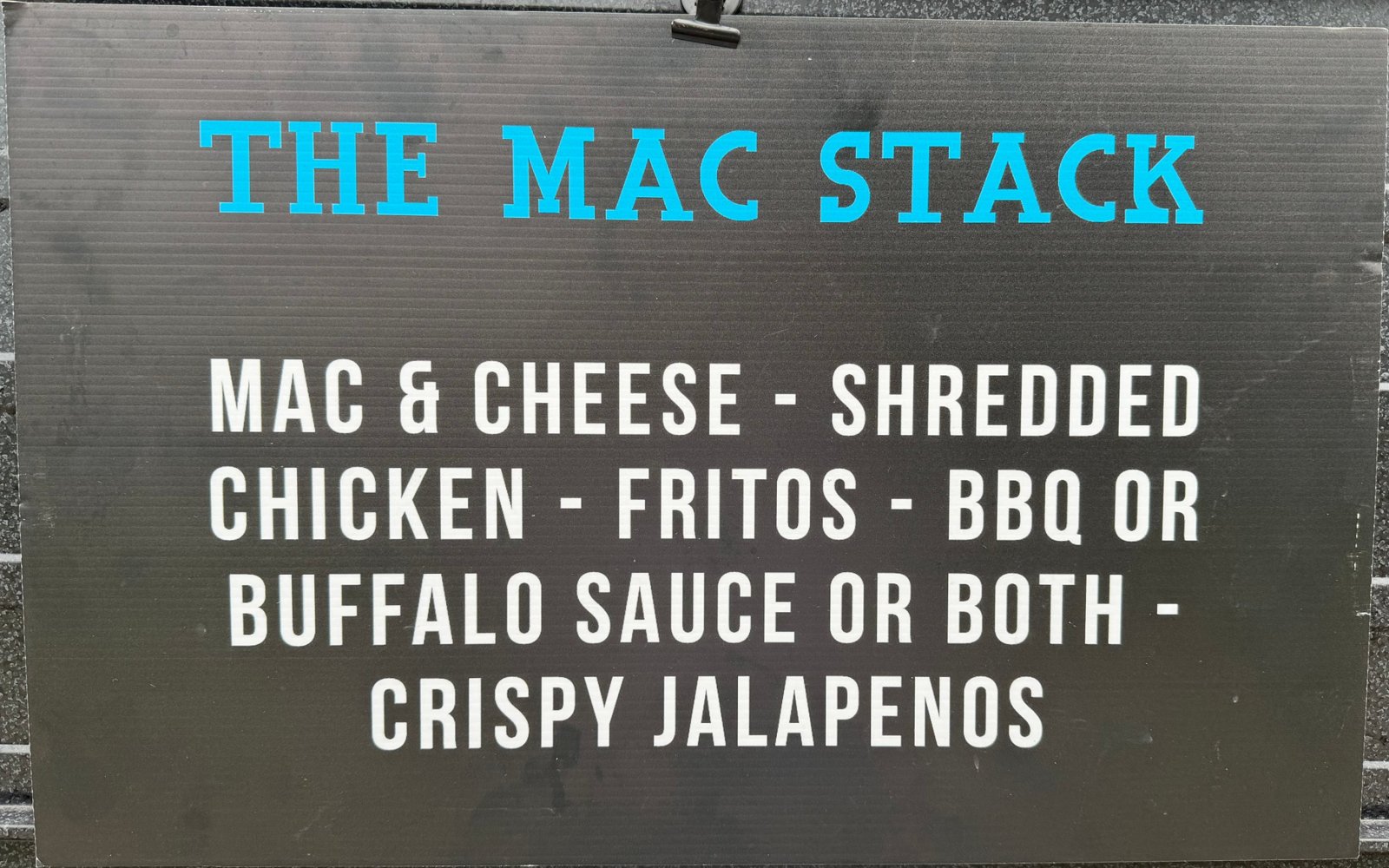 Menu sign: The Mac Stack — mac & cheese, shredded chicken, Fritos, BBQ or buffalo sauce or both, crispy jalapeños